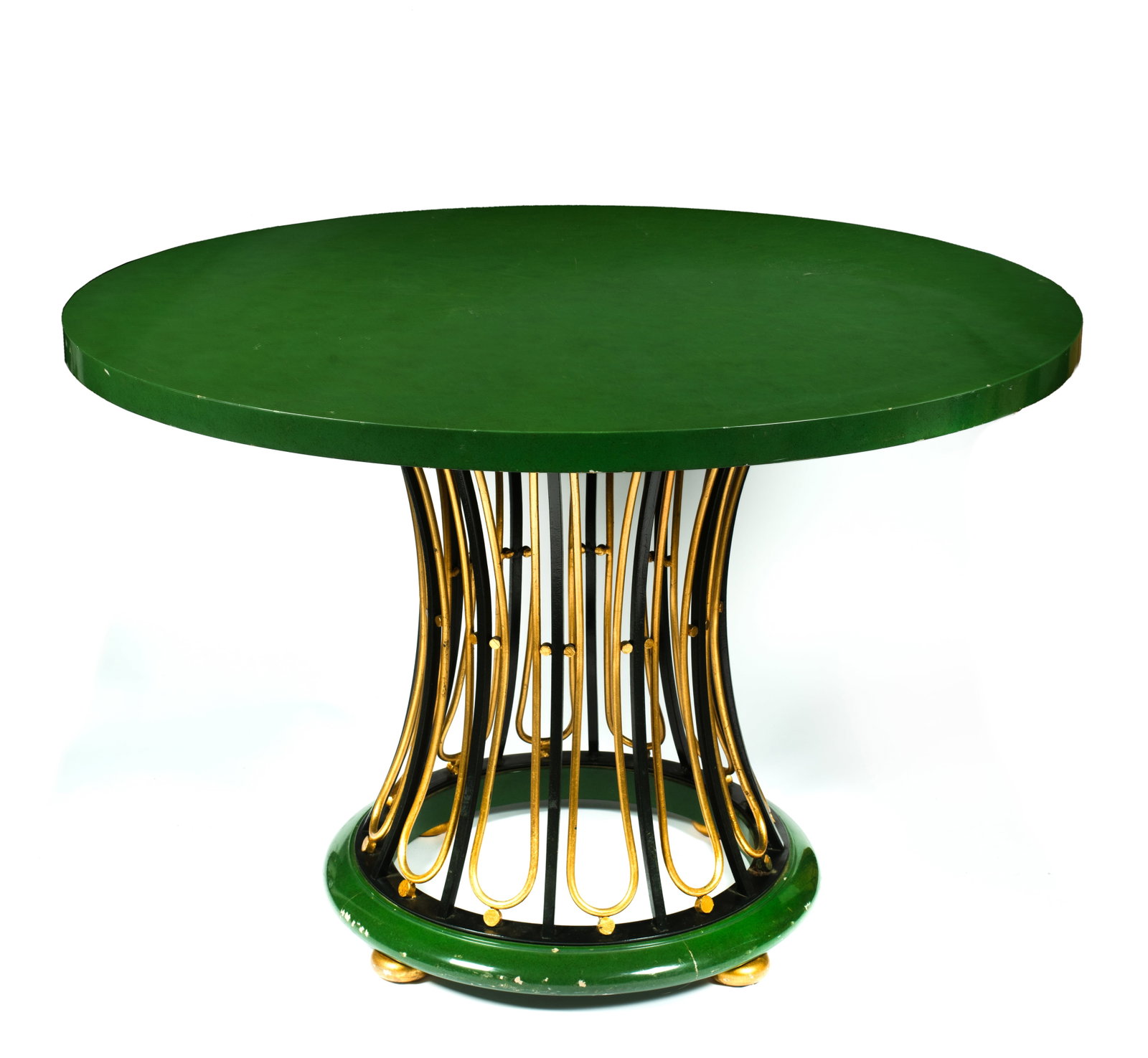 A Baker Furniture Green and Gold Hollywood Regency Table: Marked with attached plaque to the underside, "Baker Furniture", green lacquer finish to the round top and bottom of base, set on gold button feet, black and gold pedestal center base, some wear and l