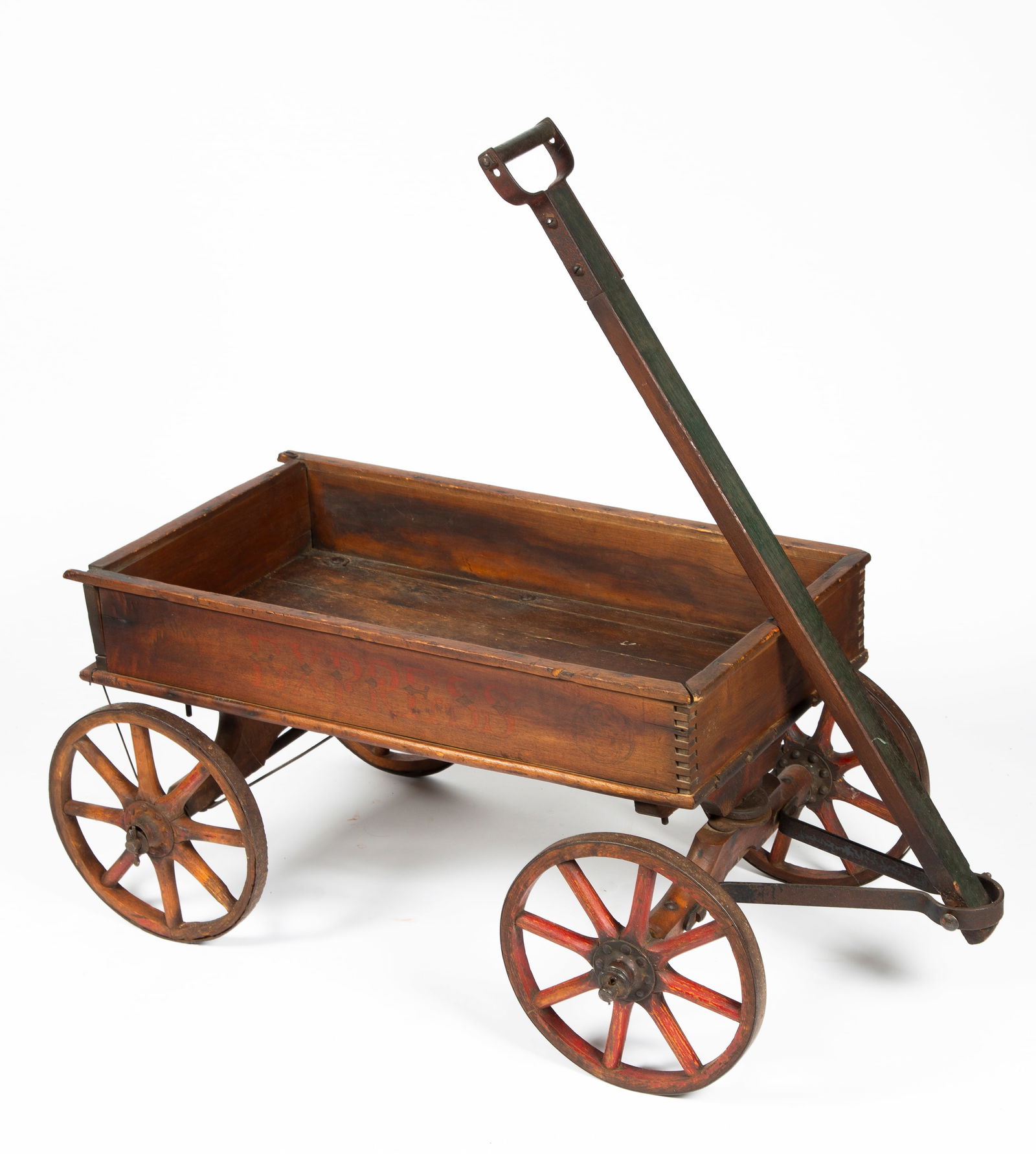 Antique Child's Buffalo Sled Co. Wagon: Stenciled on both sides "Express", marked on rear axle, "No. 2 Roller Bearing Made by the Buffalo Sled Co, North Tonawnda NY" with the logo of a bison, wood and metal construction, painted red and gre
