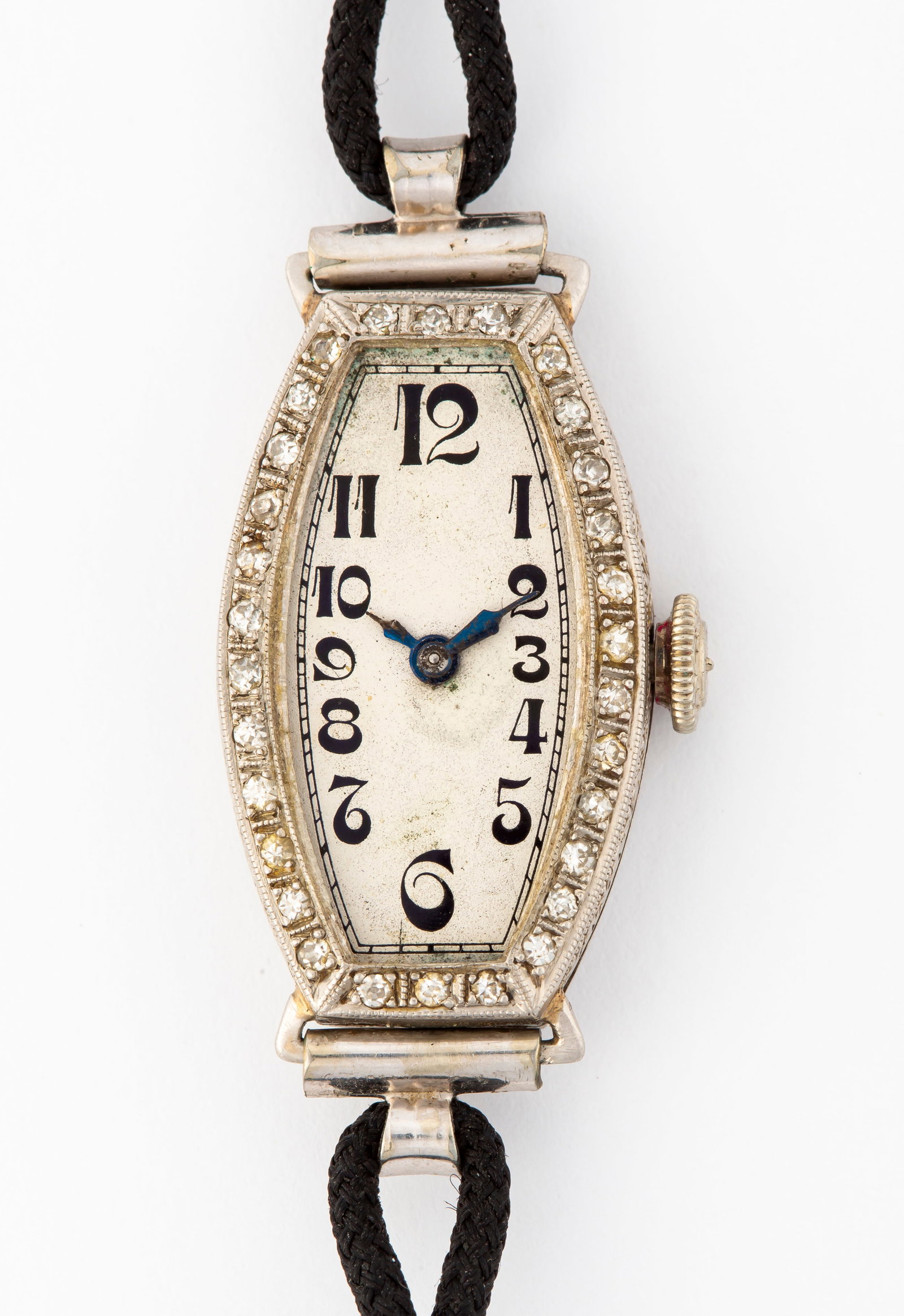 Art Deco Platinum and Diamond Ladies Watch: Case marked, "Platinum", missing crystal, diamond border, engraved case back (case back does not shut fully, needs repair), black cord strap with white gold filled buckle. Pa