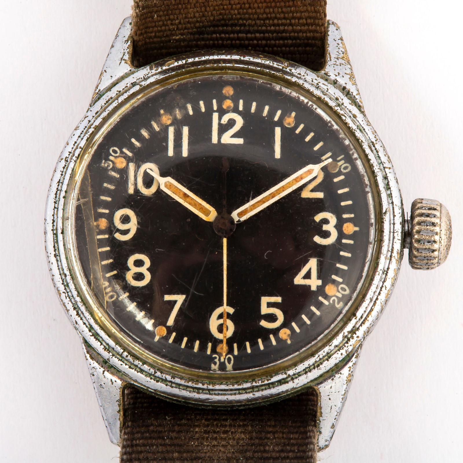 Elgin FSSC 88-w-800 Military Wristwatch, 30mm, 1945: Likely issued to a US Navy pilot, chrome plated bezel with black dial, luminous hands and dots, white numerals, decagonal screw back case back, marked FSSC 88-w-800 MFRS Part No 2109, housin