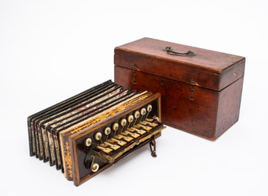 A French Busson Brevete Flutina Accordion in Original Box