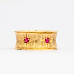 An Estate 14K Gold Ruby Band