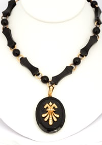 A Victorian Mourning Locket and Necklace in Gold, Onyx and Pearl