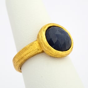 An Artisan 18K Gold and Sapphire Ring