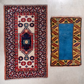 Two Small Oriental Throw Rugs