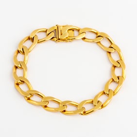 A Vintage Solid 18K Gold Curb Bracelet