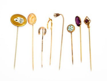 Eight Gold and Gold Tone Stick Pins