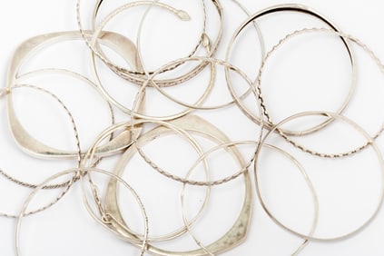 Sixteen Sterling Silver Bangle Bracelets