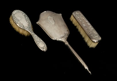A Sterling Silver Assembled Vanity Brush Set