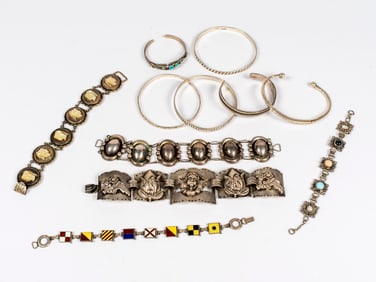 A Group of Silver and Sterling Vintage Bracelets