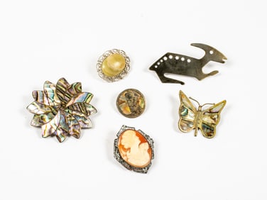 A Group of Six Silver and Silver Tone Brooches