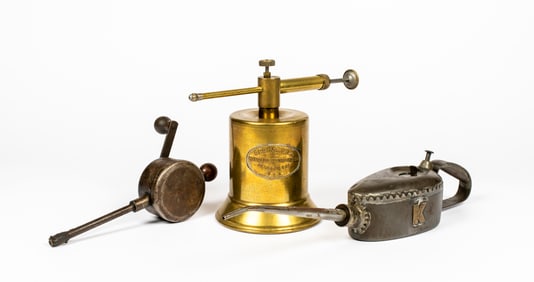 An Antique Brass Springeez Halstead Oil Lubricator and Two Other Antique Oilers