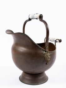 A Fireplace Scuttle with Delft Handles