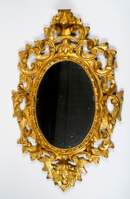 A Gilt French Rococo Style Mirror