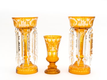 A Pair of Bohemian Amber Mantle Lustres and Vase