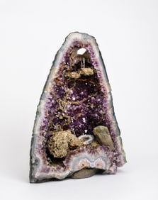 An Amethyst Geode Mining Sculpture