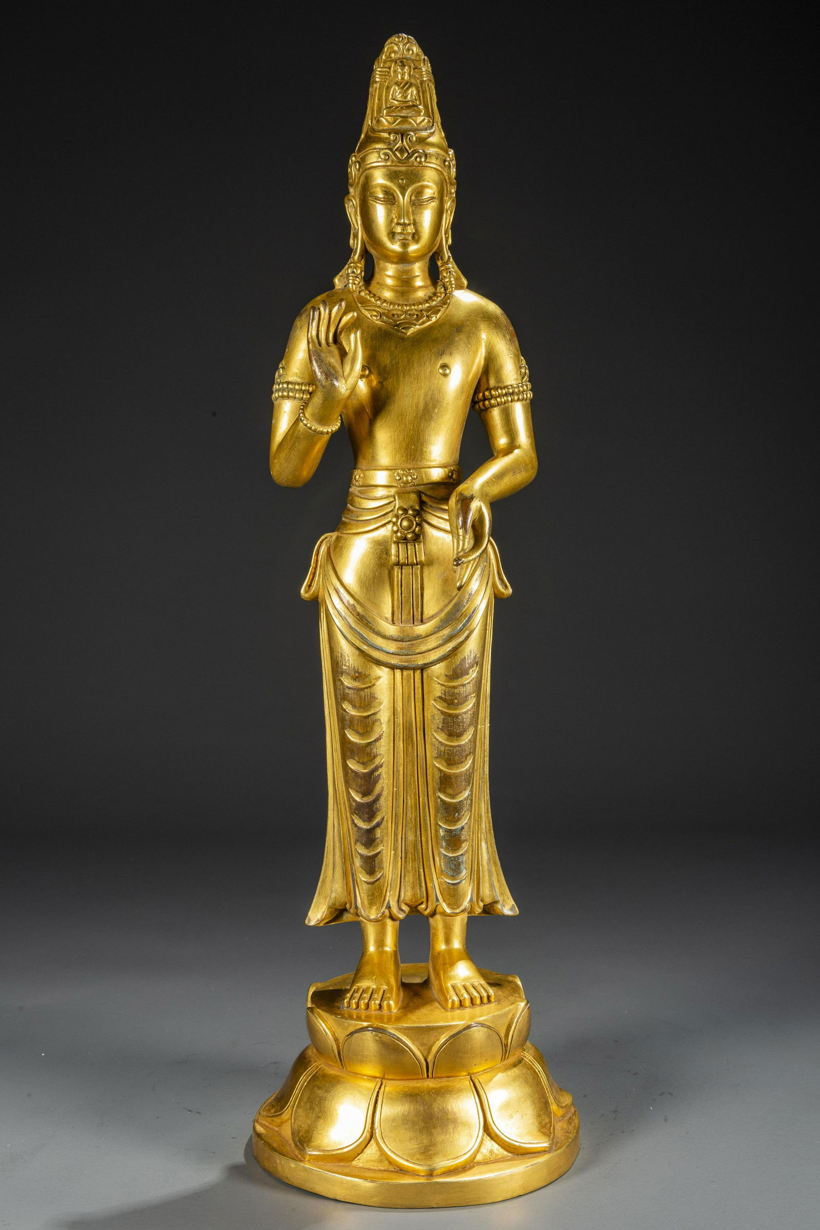A GILT BRONZE ACARYA BUDDHA STATUE. (1 of 9)
