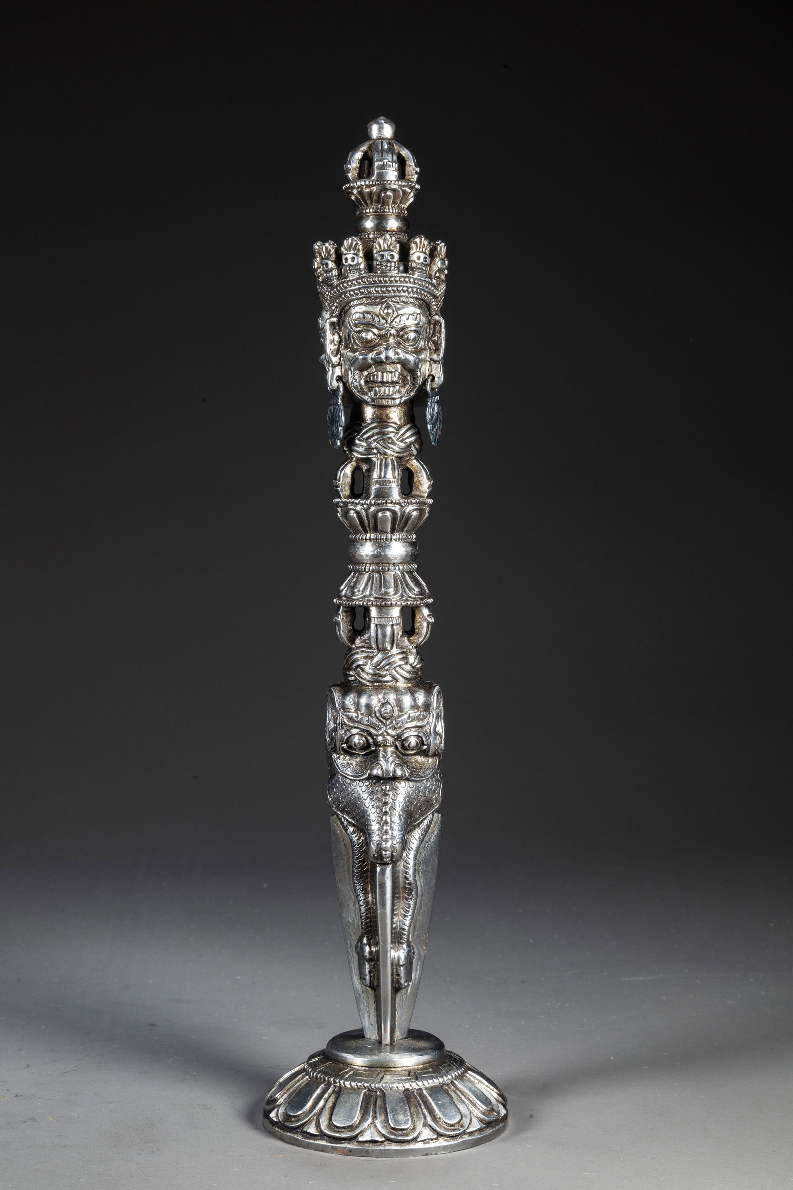 A TIBETAN CAST IRON DHARMA IMPLEMENT "JUE". (1 of 9)