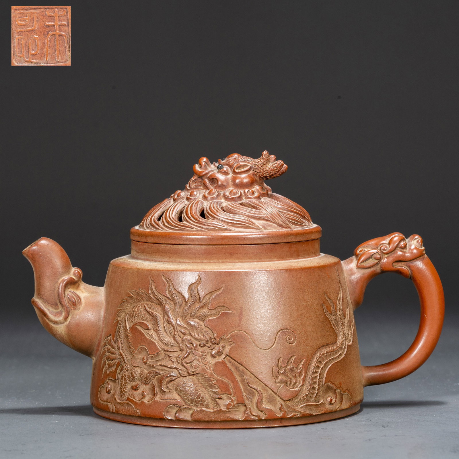 A PURPLE CLAY TEAPOT WITH DRAGON DESIGN. (1 of 11)