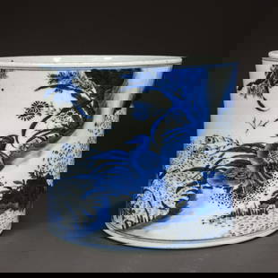A BLUE-AND-WHITE PORCELAIN WRITING-BRUSH POT.: Blue-and-White Porcelain Writing-Brush Pot, with Flowers and Birds Design.
