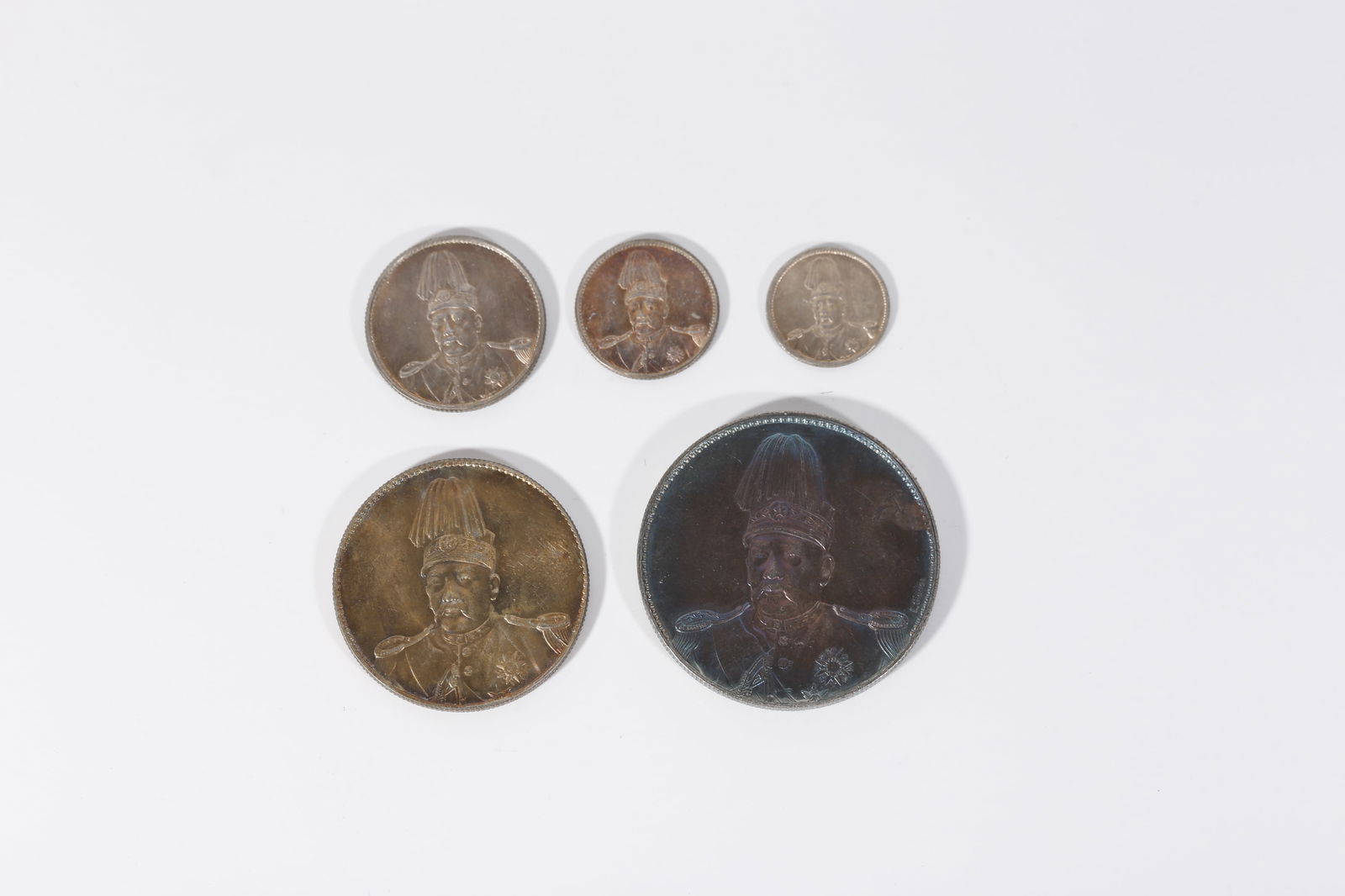 A SILVER DOLLAR COIN (1 of 4)