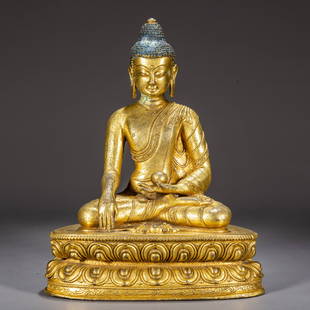 A GILT BRONZE SAKYAMUNI BUDDHA STATUE.: Gilt Bronze Sakyamuni Buddha Statue.