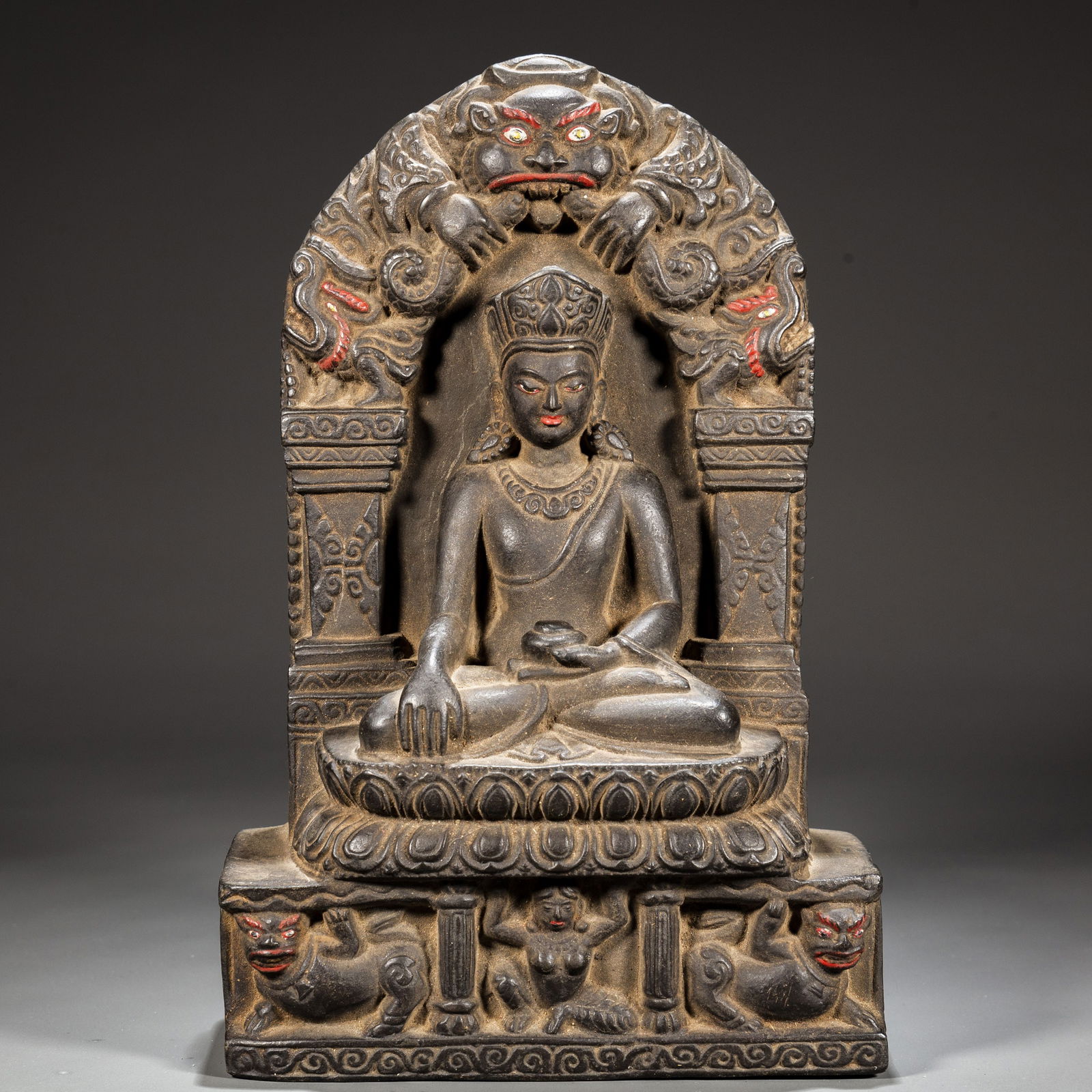 A BLACK STONE SAKYAMUNI BUDDHA STATUE. (1 of 9)