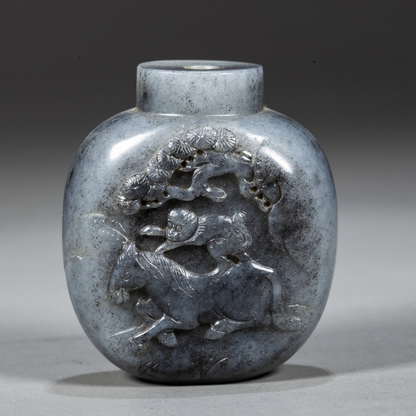 A BLUE-AND-WHITE JADE SNUFF BOTTLE.: Blue-and-White Jade Snuff Bottle, Carved Horse and Monkey Design, Symbolize Promotion and Success.