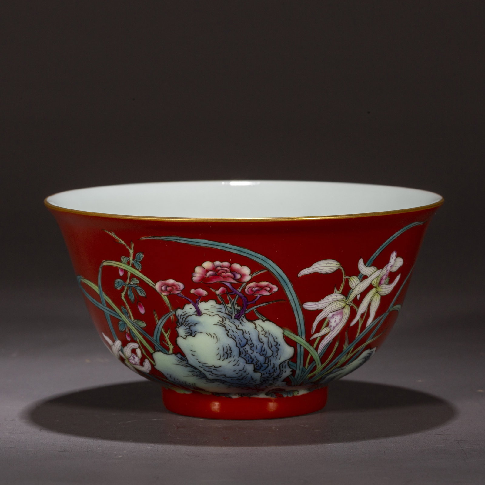 A CORAL-RED GLAZED PORCELAIN BOWL.: Coral-Red Glazed Porcelain Bowl, with Foreign-Color Ganoderma and Flowers Design, Symbolize Longevity.