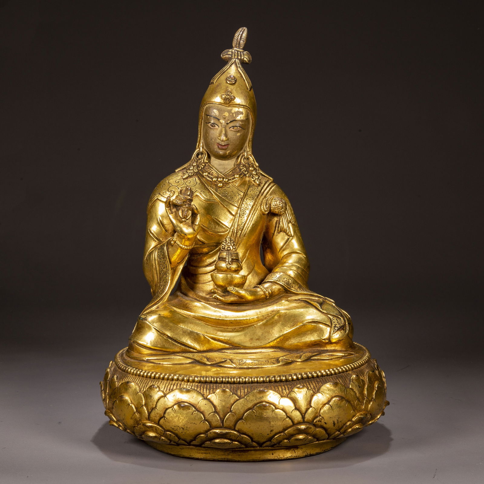 A GILT BRONZE PADMASAMBHAVA BUDDHA STATUE. (1 of 9)