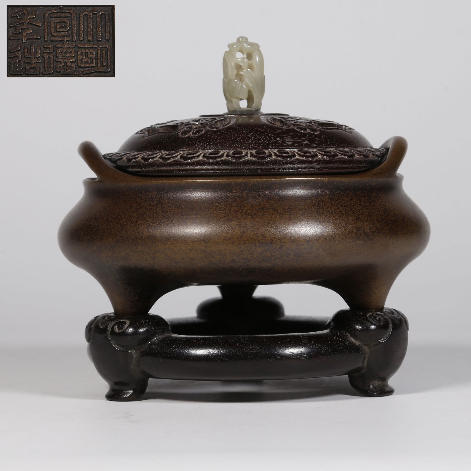 A BRONZE CENSER WITH BRIDGE-SHAPED EARS. (1 of 10)