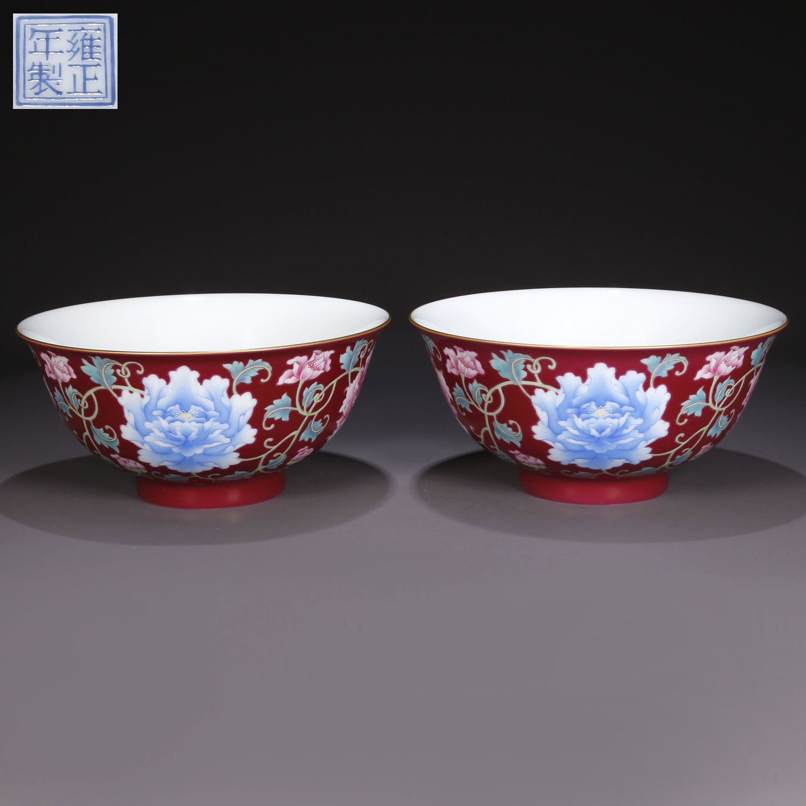 A SET OF SHINY RED GLAZED PORCELAIN BOWLS. (1 of 9)