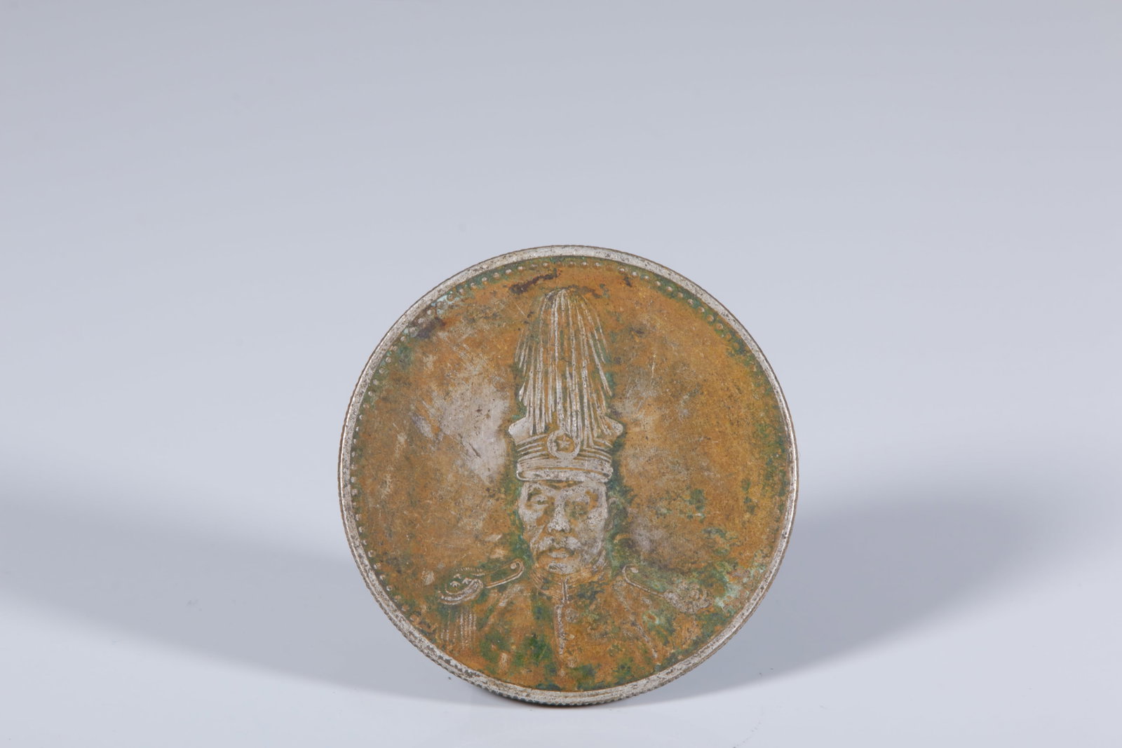 A SILVER DOLLAR COIN: One silver dollar