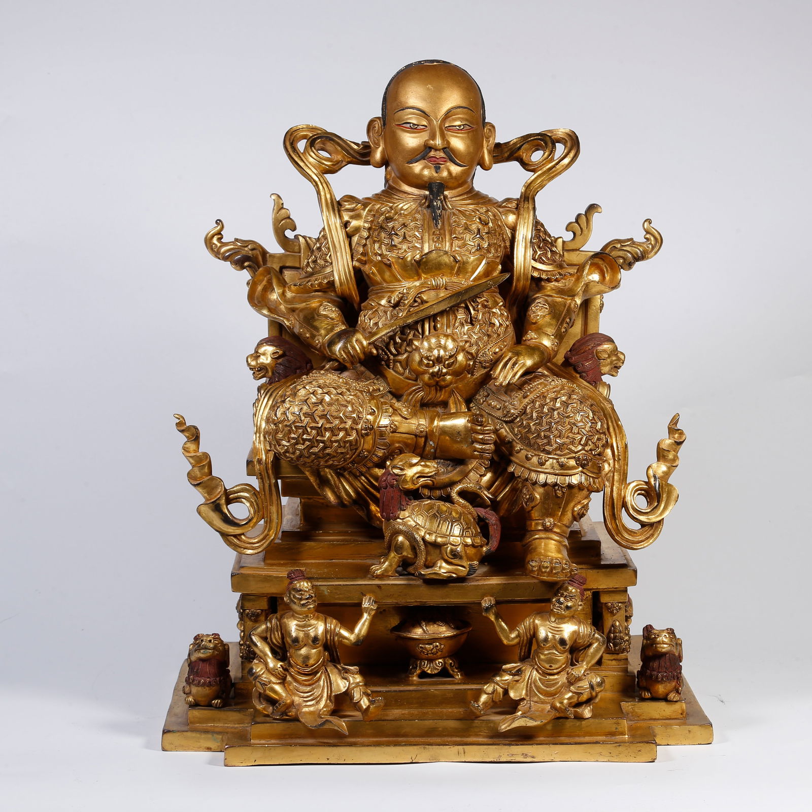 A GILT BRONZE STATUE OF ZHENWU EMPEROR (1 of 9)