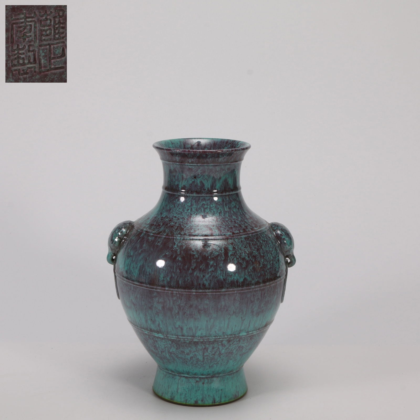 A LU JUN GLAZE VASE WITH STRING PATTERNS AND ANIMAL-HEAD HANDLES: Lu Jun glaze vase with string patterns and animal-head handles