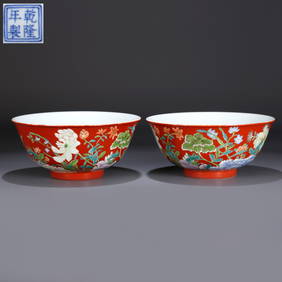 A A PAIR OF RED-GROUND FAMILLE ROSE FLORAL BOWLS (1 of 10)