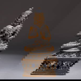 A BRONZE BUDDHA STATUE: Bronze Buddha statue