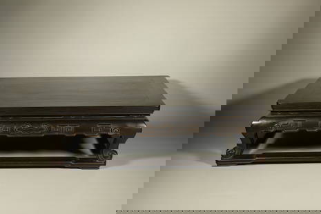 A ZITAN CARVED KANG TABLE WITH LINGZHI PATTERN: Zitan Carved Kang Table with Lingzhi Pattern