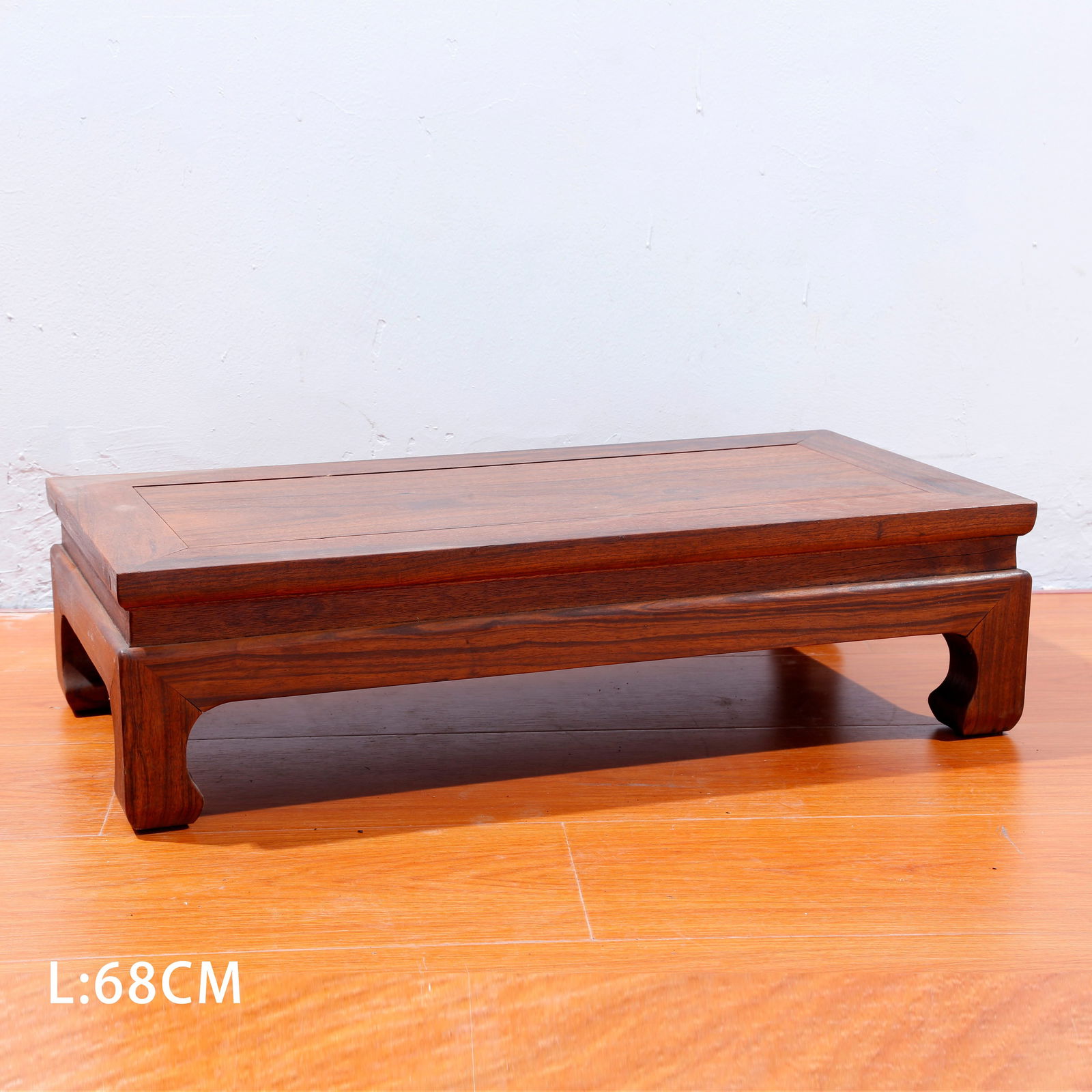 A HUANGHUALI WOOD CARVED TEA TABLE: Huanghuali Wood Carved Tea Table