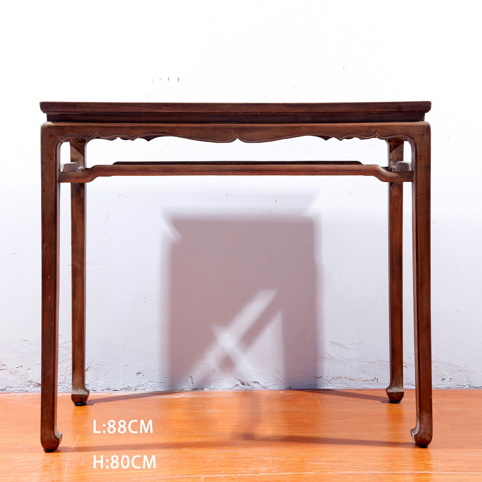 A HUANGHUALI WOOD TEA TABLE: Huanghuali Wood Tea Table