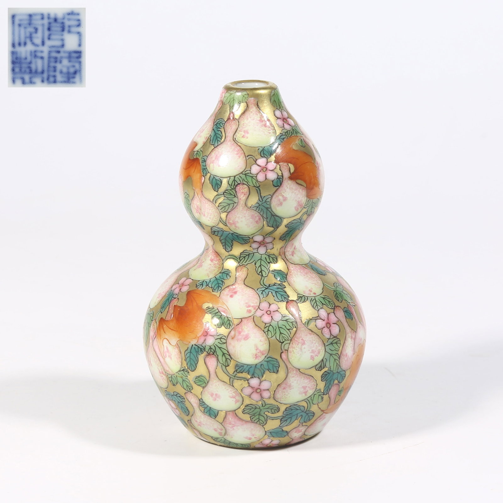 A GOLD-GROUND FAMILLE-ROSE GOURD-SHAPED SNUFF BOTTLE WITH "FORTUNE, PROSPERITY, AND LONGEVITY" MOTIF (1 of 9)