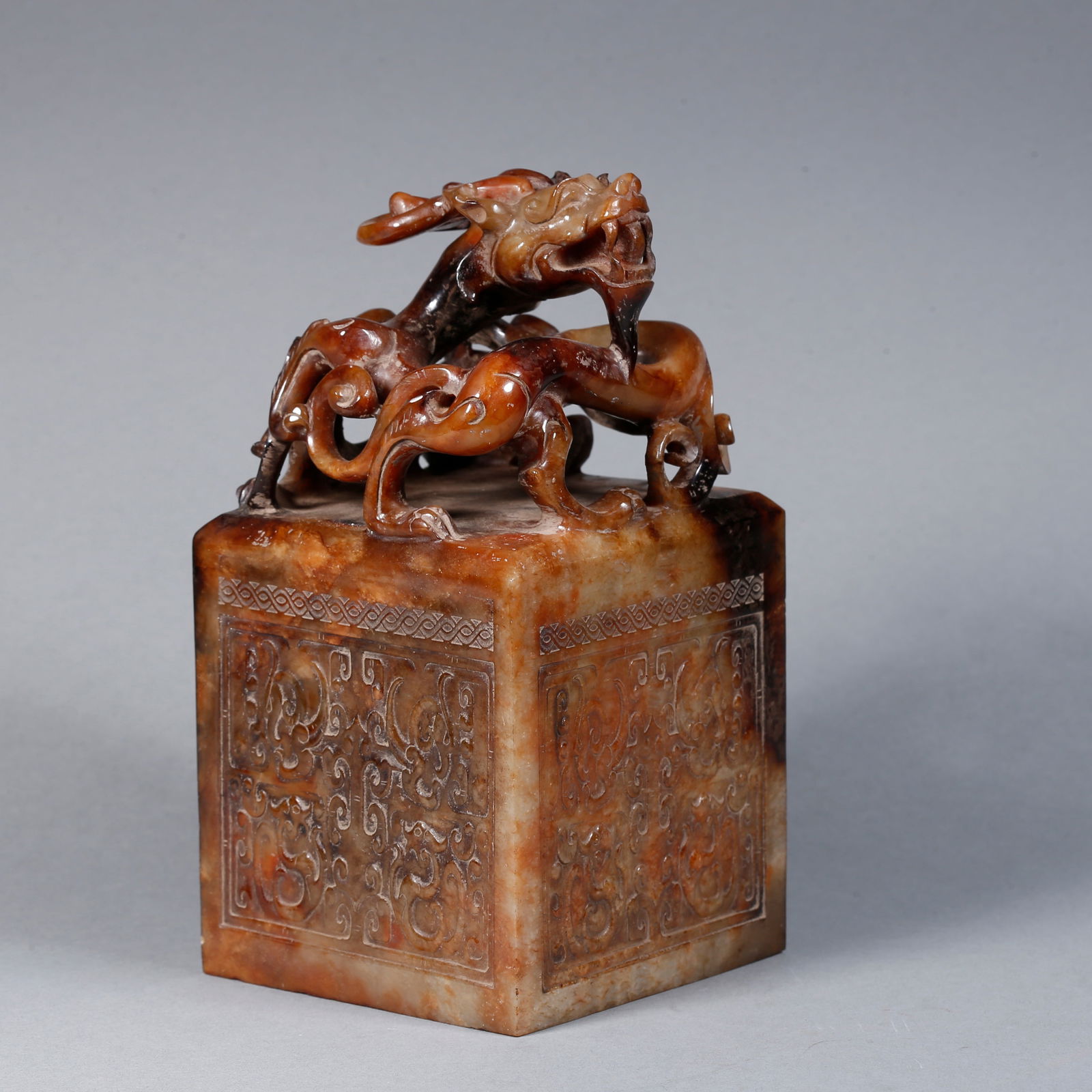 A ARCHAIC JADE CARVED SEAL WITH CHI-DRAGON-FORM FINIAL (1 of 10)