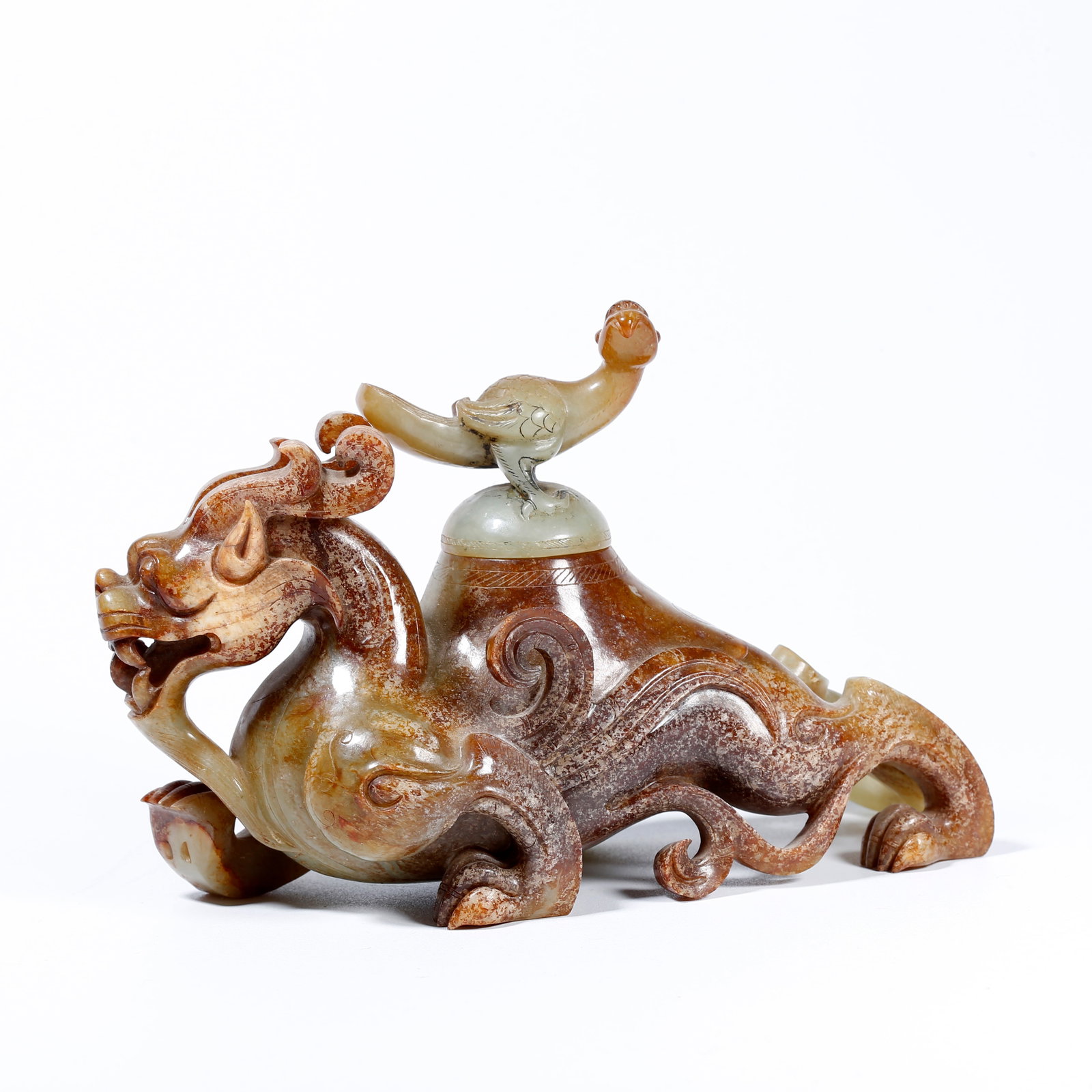 A HETIAN JADE CARVING OF A CHI TIGER-SHAPED ORNAMENT (1 of 10)