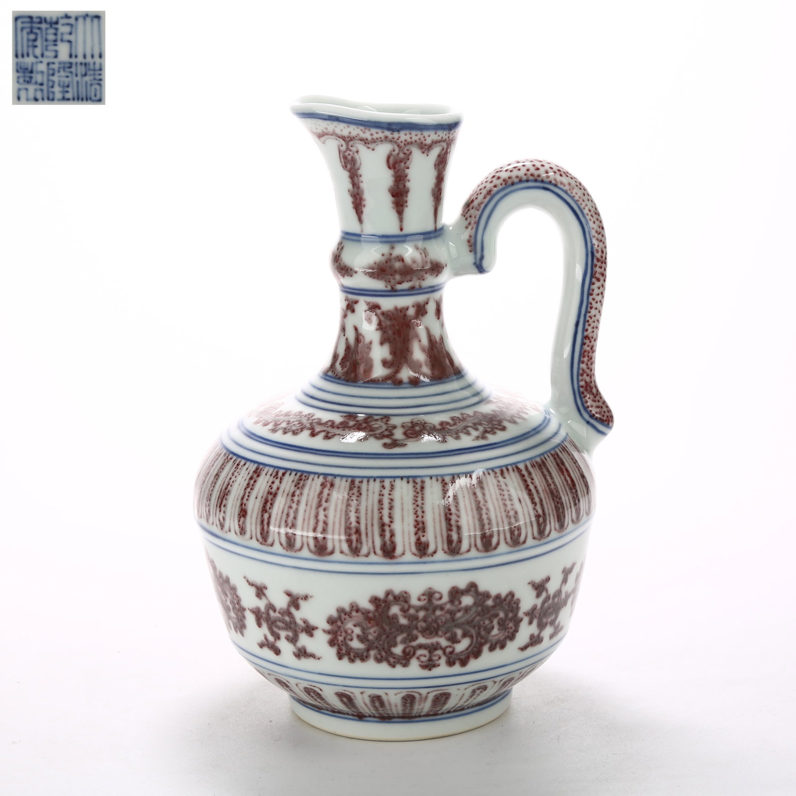A BLUE AND WHITE WITH UNDERGLAZE RED FLOWER SPRINKLER: Blue and White with Underglaze Red Flower Sprinkler