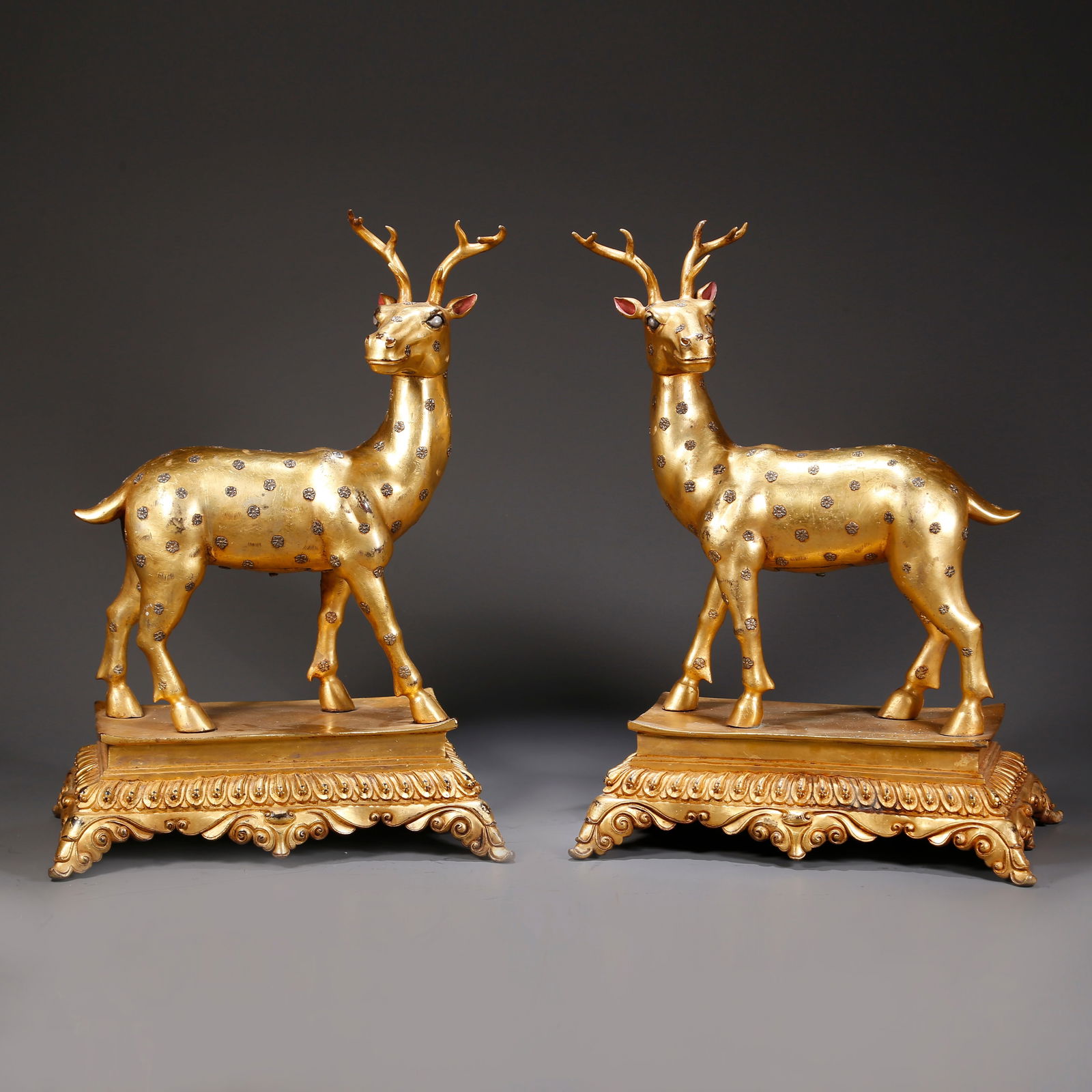 A GILDED BRONZE DEER ORNAMENTS (A PAIR): Gilded bronze deer ornaments (a pair)