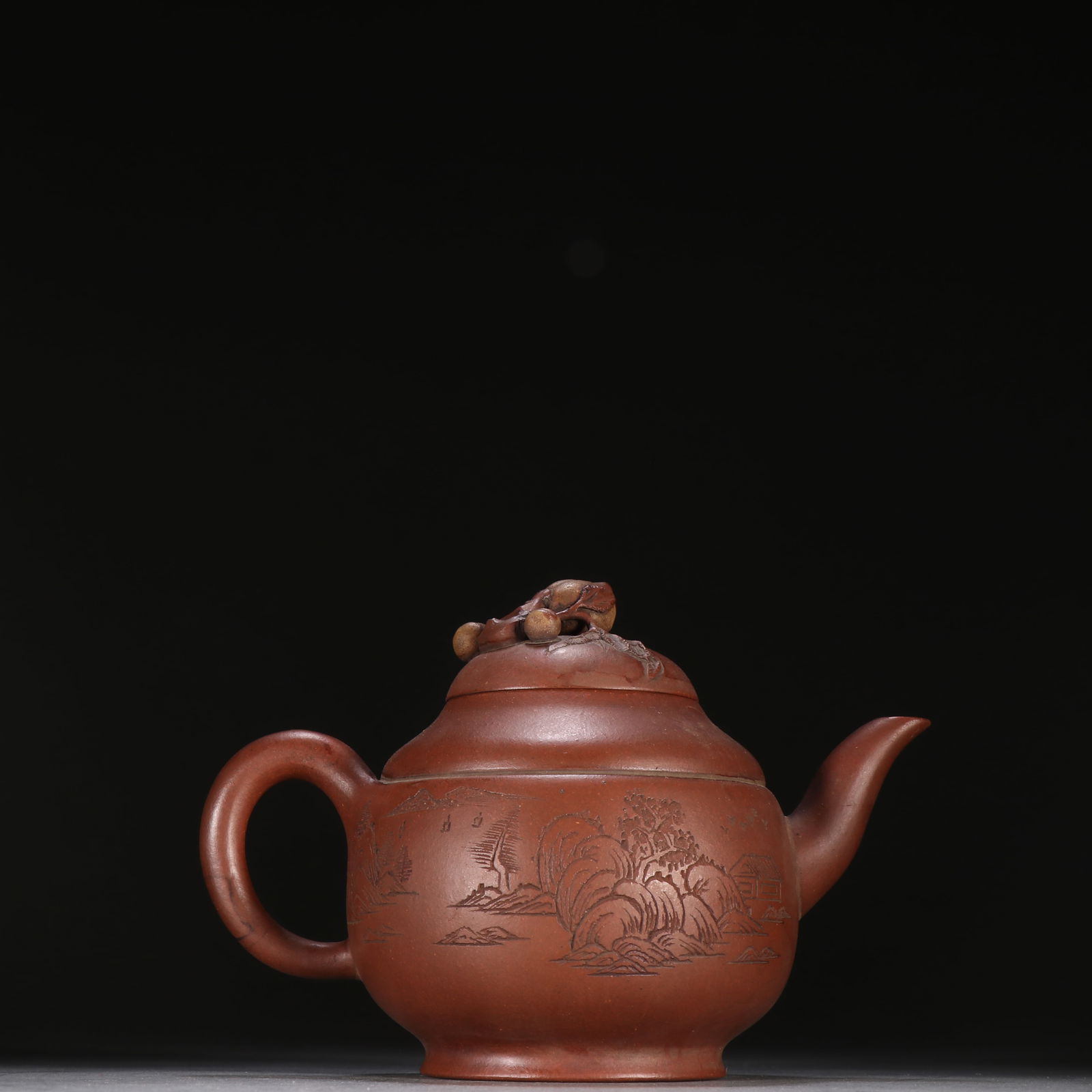 A YIXING ZISHA LANDSCAPE TEAPOT (1 of 9)