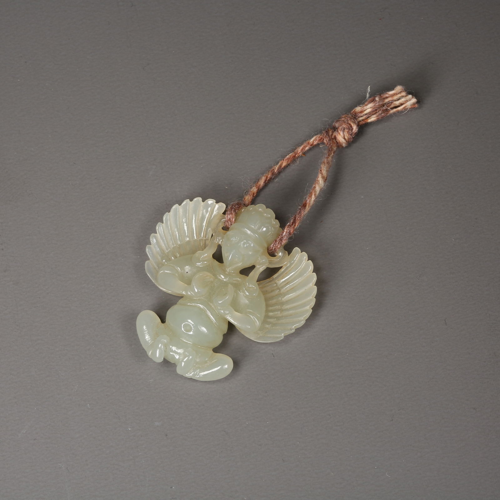 A HETIAN JADE ROC PENDANT: Hetian Jade Roc Pendant