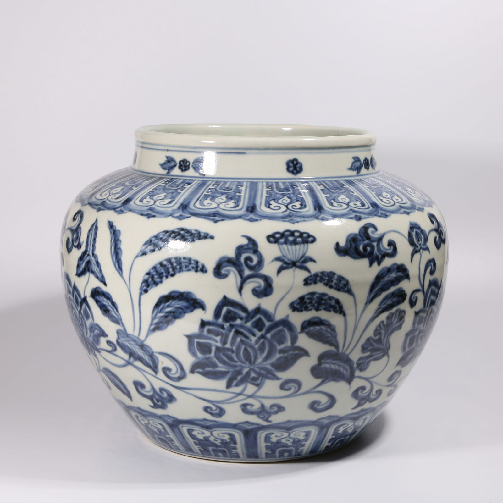 A BLUE-AND-WHITE JAR WITH TWINING LOTUS MOTIF (1 of 9)