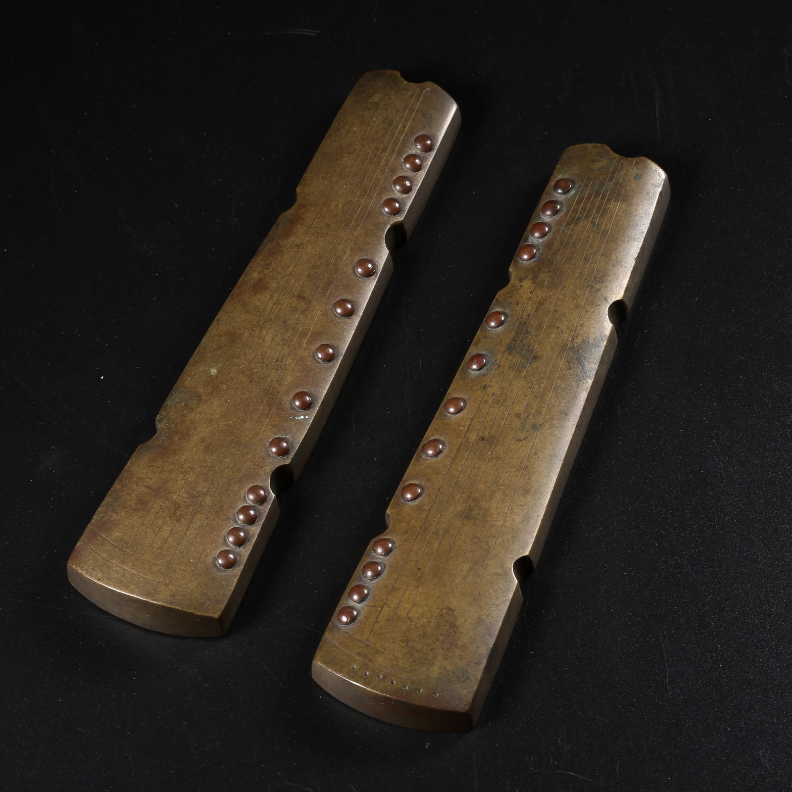 A SET OF BRONZE QIN PAPERWEIGHTS: Set of bronze qin paperweights