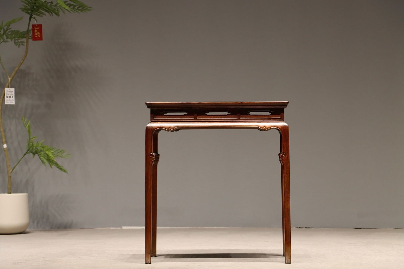 A HUANGHUALI INCENSE STAND: Huanghuali incense stand